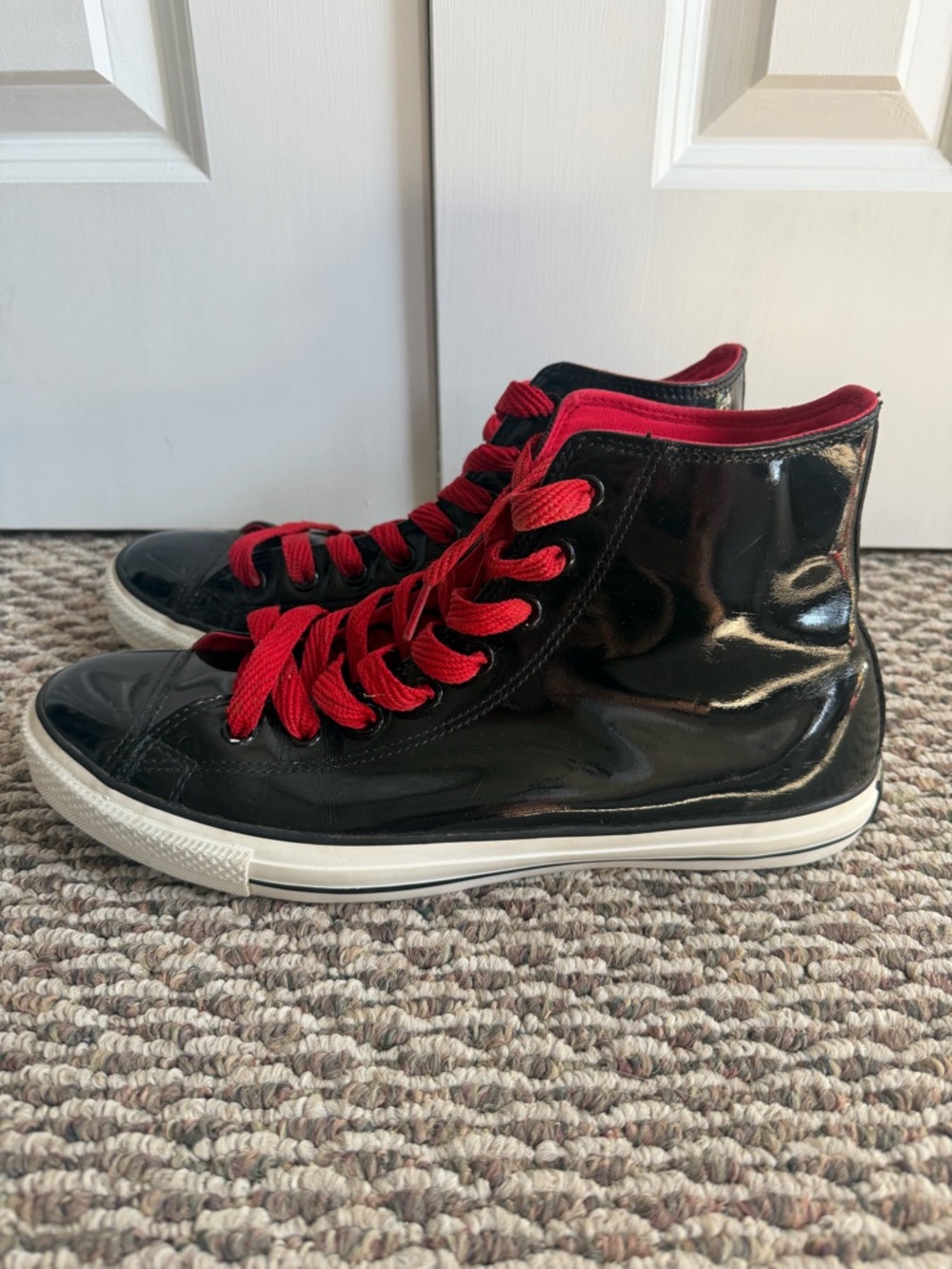 High-Top Black Leather Converse with Red Laces and Red Interior